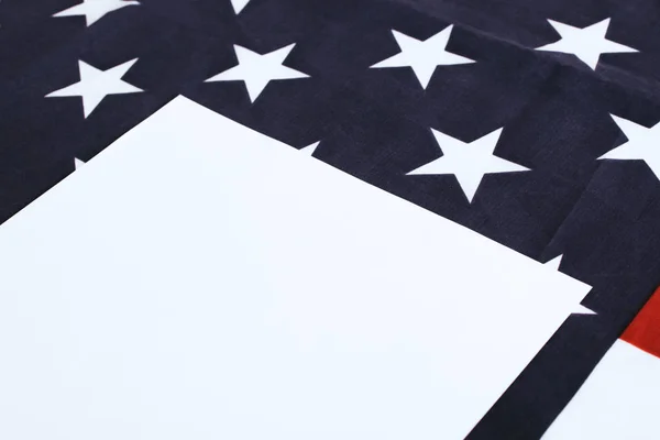 White paper with copy space near american flag — Stock Photo