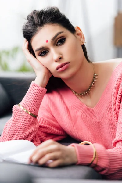 Upset exhausted indian student with bindi studying at home — Stock Photo