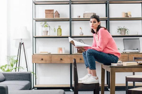 Indian student with bindi studying with notebook at home — Stock Photo