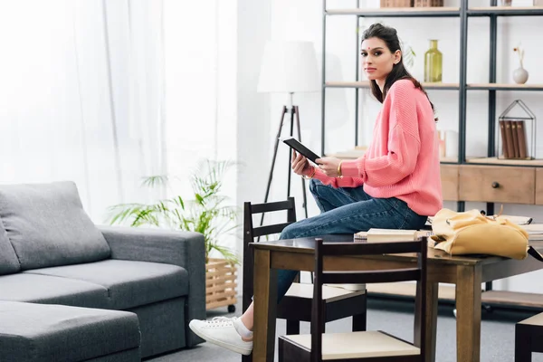 Female indian student studying with notebooks at home — Stock Photo