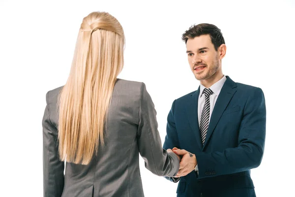 Hombre de negocios estrechando la mano con su colega y haciendo trato aislado en blanco - foto de stock