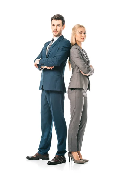 Confident businesspeople in suits posing with crossed arms isolated on white — Stock Photo