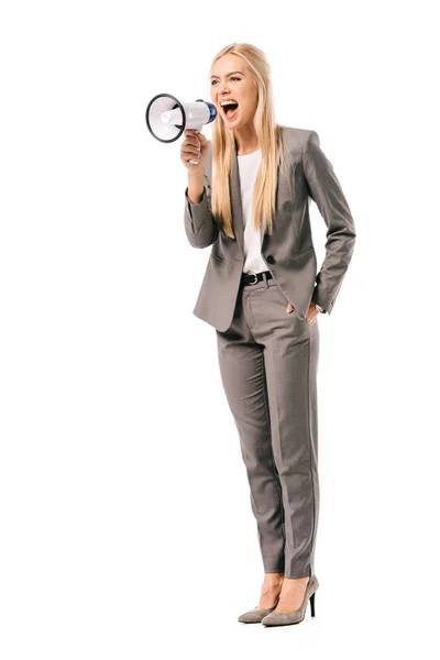 Emotional businesswoman shouting with megaphone, isolated on white — Stock Photo