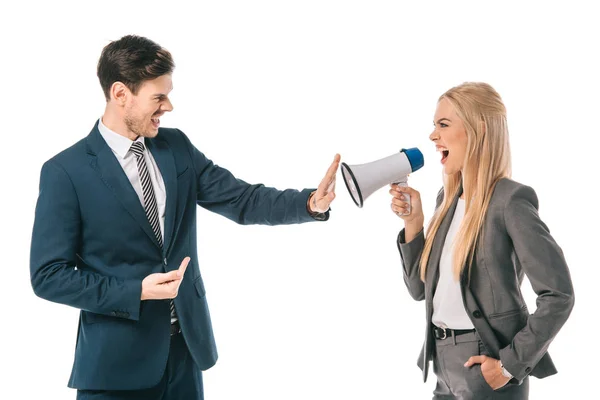 Female boss shouting into megaphone at male employee who showing stop gesture isolated on white, gender equality concept — Stock Photo