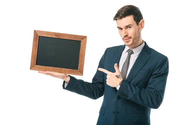 Schöner Geschäftsmann zeigt auf leeres Brett in Holzrahmen, isoliert auf weiß — Stockfoto