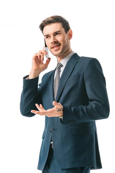 Ejecutivo hombre de negocios hablando en el teléfono inteligente aislado en blanco - foto de stock