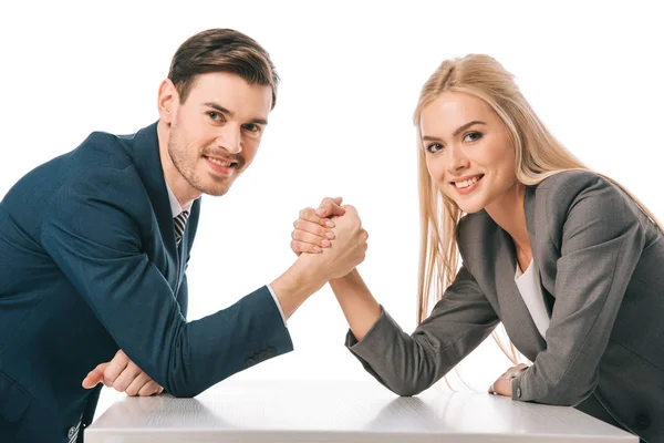 Smiling businesspeople arm wretsling isolated on white — Stock Photo