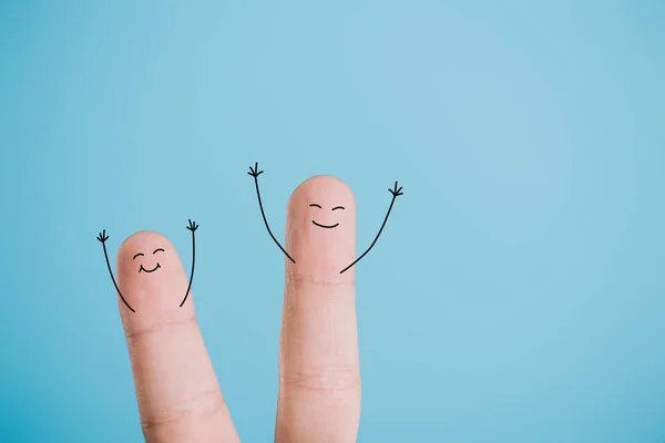 Cropped view of happy excited fingers isolated on blue — Stock Photo