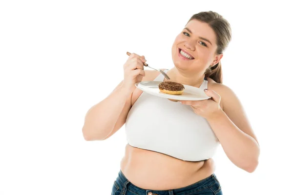 Smiling overweight woman holding sweet doughnut on plate isolated on white, body positivity concept — Stock Photo