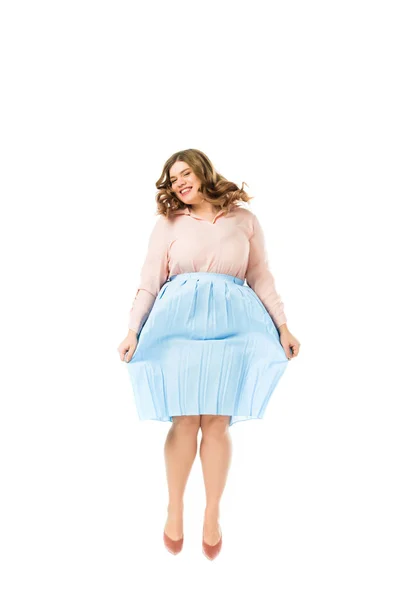 Happy smiling elegant overweight woman jumping isolated on white — Stock Photo