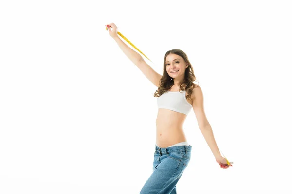 Cheerful woman holding measuring tape isolated on white, lose weight concept — Stock Photo