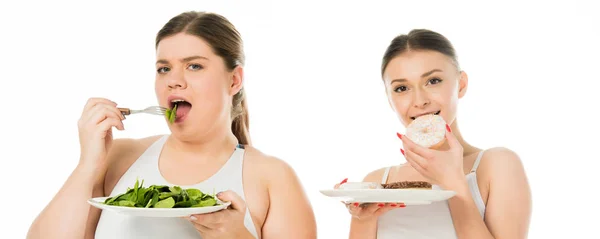 Donna magra mangiare ciambelle mentre donna in sovrappeso mangiare foglie di spinaci verdi isolate su bianco — Foto stock