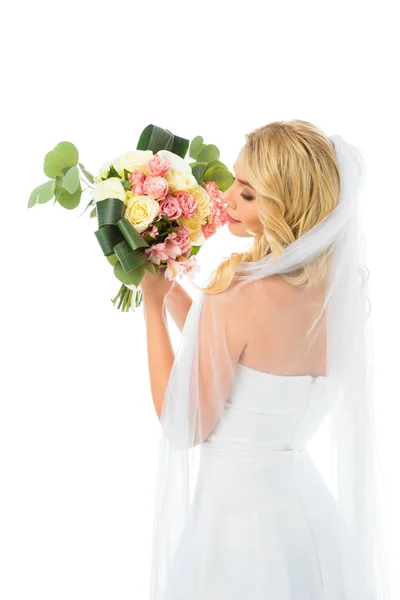 Attractive bride holding beautiful wedding bouquet isolated on white — Stock Photo