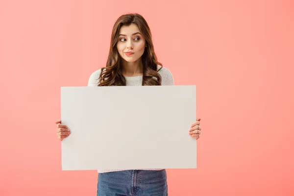 Beautiful woman holding empty board with copy space isolated on pink — Stock Photo