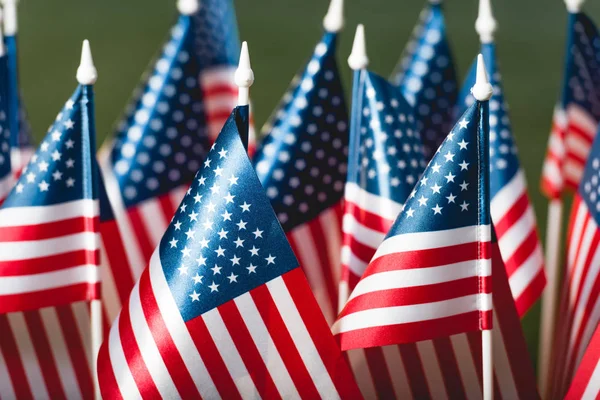 Selective focus of stars and stripes on american flags — Stock Photo