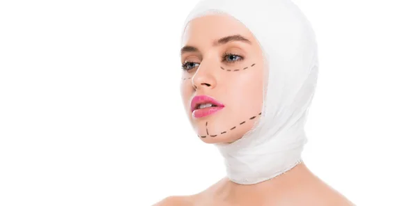 Panoramic shot of nude young woman with bandaged head and marks on face isolated on white — Stock Photo