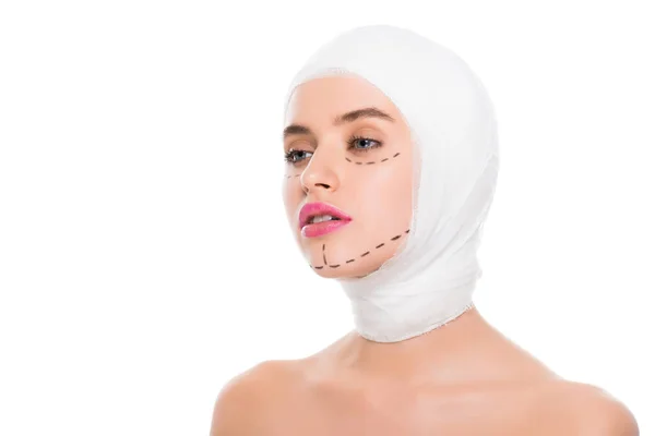 Pretty woman with bandaged head and marks on face isolated on white — Stock Photo