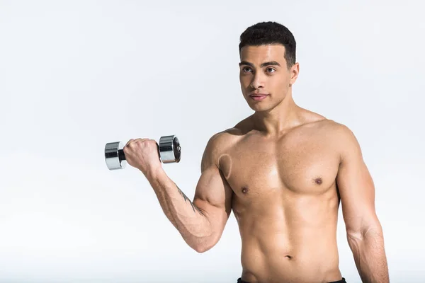 Handsome mixed race man with shirtless muscular torso holding dumbbell on white — Stock Photo