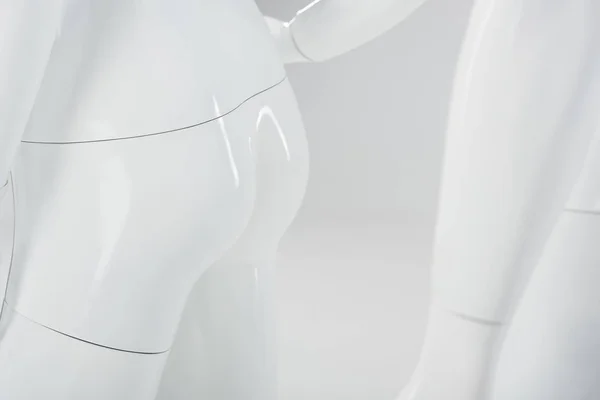 Крупный план белых пластиковых мансард на сером фоне — стоковое фото