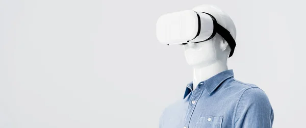 Panoramic shot of mannequin in clothes with Virtual reality headset isolated on grey with copy space — Stock Photo