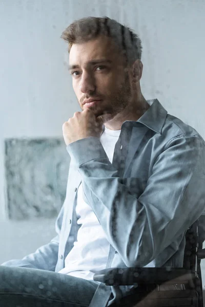 Selective focus of sad disabled man on wheelchair — Stock Photo