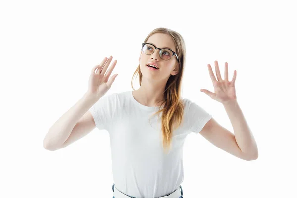 Curious teenage girl in glasses gesturing isolated on white — Stock Photo