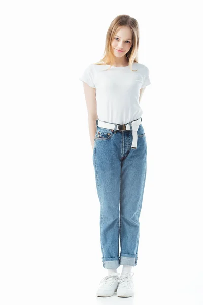 Smiling shy teenage girl looking at camera isolated on white — Stock Photo