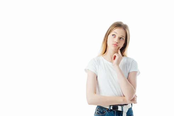 Chica adolescente soñadora mirando hacia otro lado aislado en blanco - foto de stock