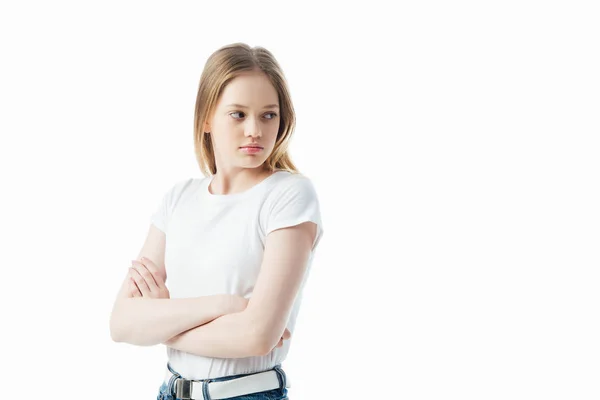 Offeso adolescente con le braccia incrociate guardando lontano isolato su bianco — Foto stock