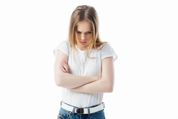 Offeso adolescente con le braccia incrociate guardando lontano isolato su bianco — Foto stock