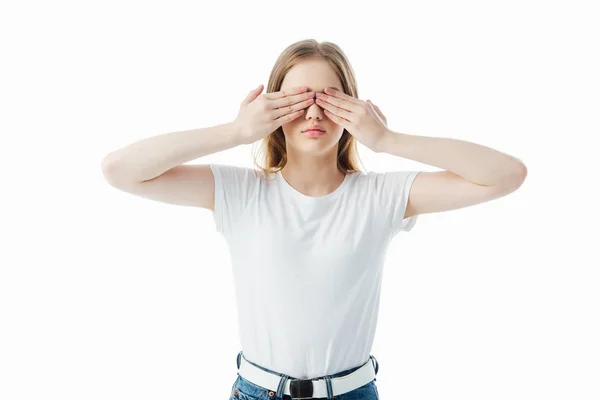 Teenage girl covering eyes with hands isolated on white with copy space — Stock Photo