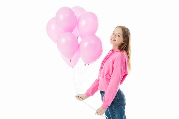 Menina adolescente feliz com balões rosa olhando para a câmera isolada no branco — Fotografia de Stock
