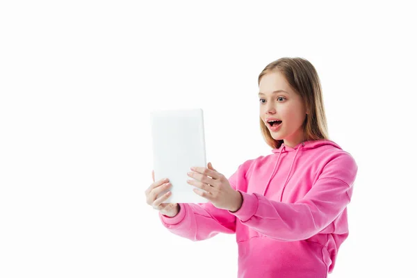 Excited teenage girl having video chat on digital tablet isolated on white — Stock Photo