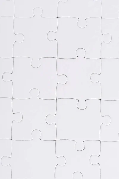 Top view of set with white jigsaw puzzle pieces — Stock Photo