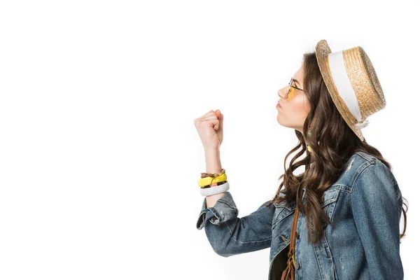 Side view of angry boho girl holding fist up isolated on white — Stock Photo