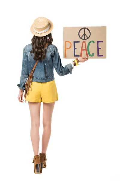 Back view of boho girl holding placard with inscription isolated on white — Stock Photo
