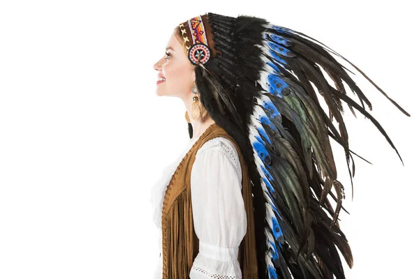 Side view of smiling pretty boho girl in indian headdress isolated on white — Stock Photo