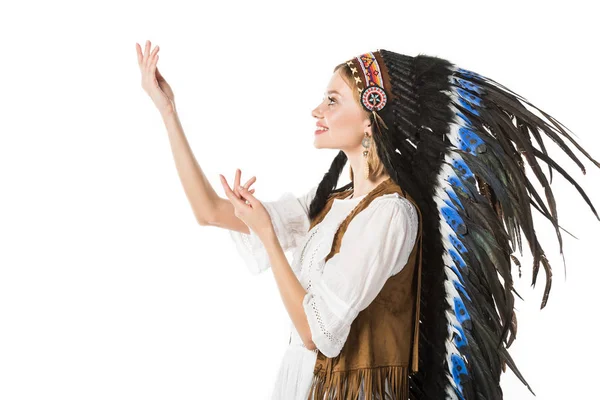 Side view of pretty boho girl in indian headdress isolated on white — Stock Photo