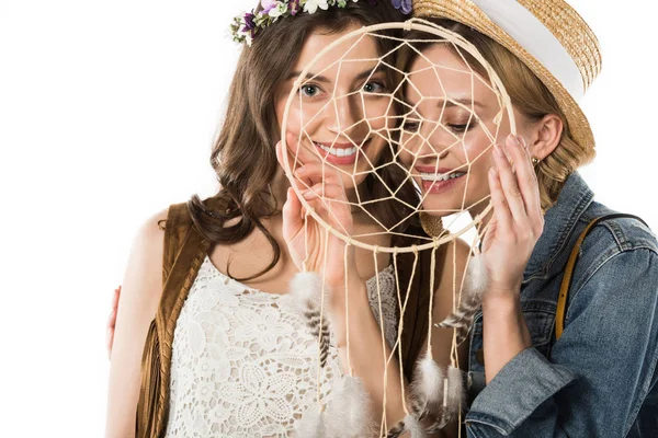 Smiling bisexual couple with dreamcatcher isolated on white — Stock Photo