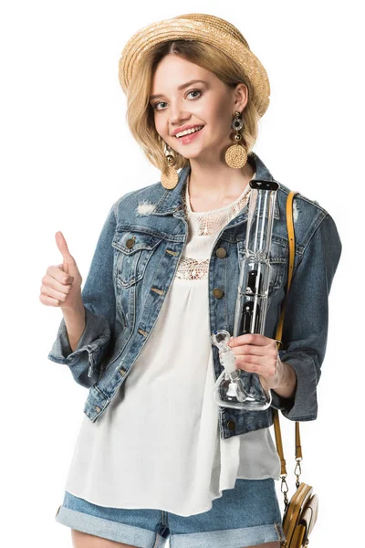 Stylish hippie girl holding bong and showing thumb up isolated on white — Stock Photo