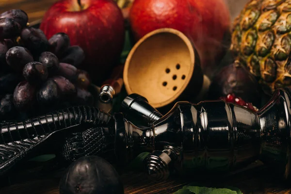 Selective focus of fresh tasty fruits and hookah — Stock Photo