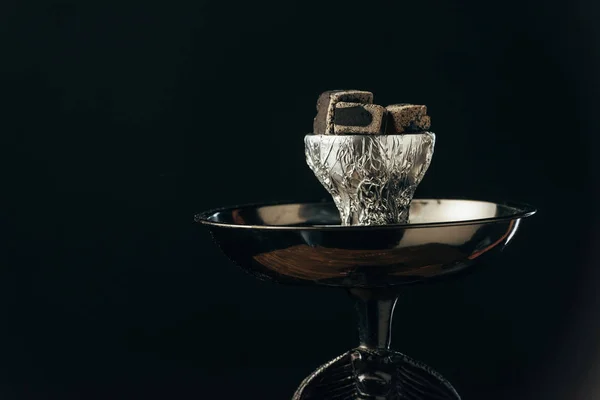 Coals on bowl and hookah isolated on black — Stock Photo