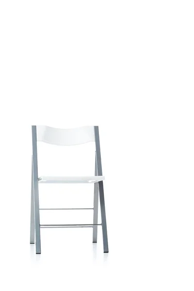 Stainless folding chair on white with copy space — Stock Photo