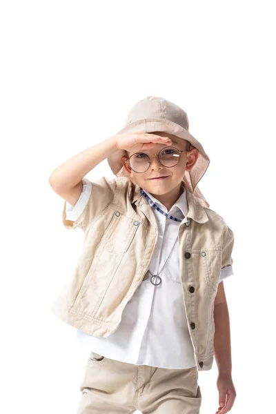 Smiling explorer child in glasses and hat looking at camera isolated on white — Stock Photo