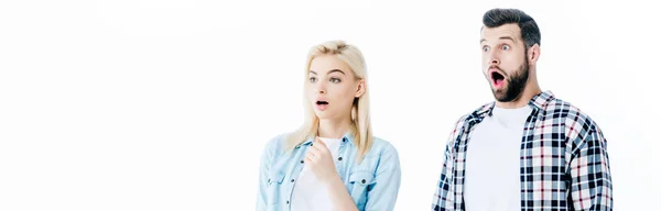 Panoramic shot of shocked girl and man looking away Isolated On White — Stock Photo