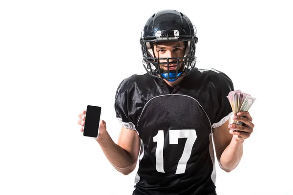 Crier joueur de football américain avec smartphone et argent isolé sur blanc — Photo de stock