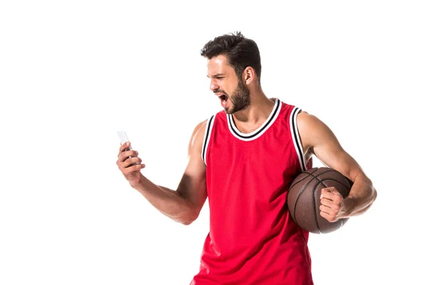 Basketball player using smartphone and screaming Isolated On White — Stock Photo