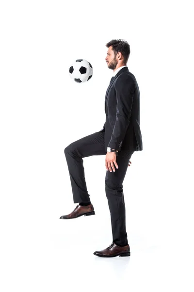 Handsome businessman in formal wear training with soccer ball Isolated On White — Stock Photo