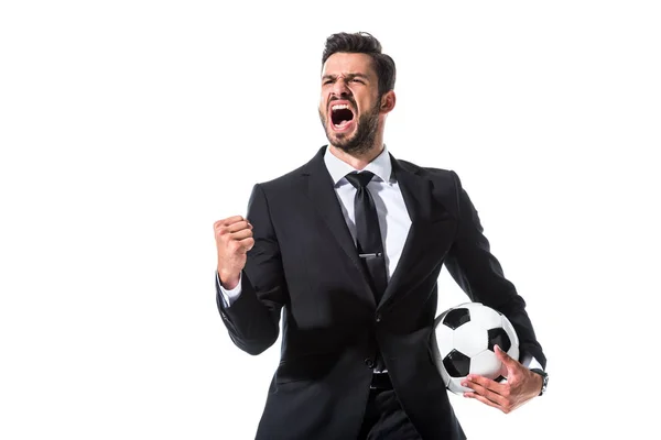 Yelling businessman in formal wear with soccer ball and clenched hand Isolated On White — Stock Photo