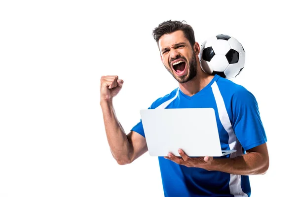Soccer player with ball using laptop and cheering Isolated On White — Stock Photo